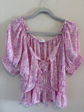 Lavender purple and white blouse with puff sleeves floral design throughout